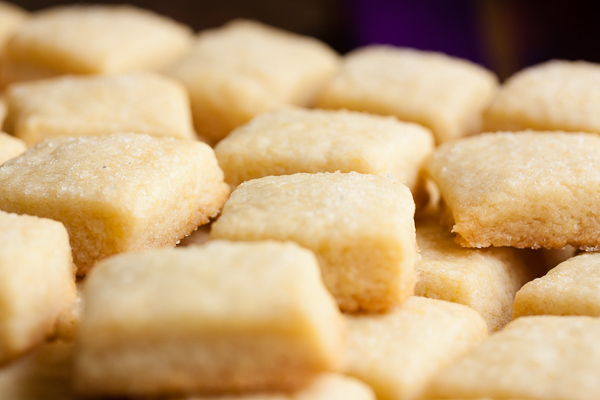 This tiny lemon shortbread cookie is soft and tender and buttery. A lovely variation on traditional shortbread.