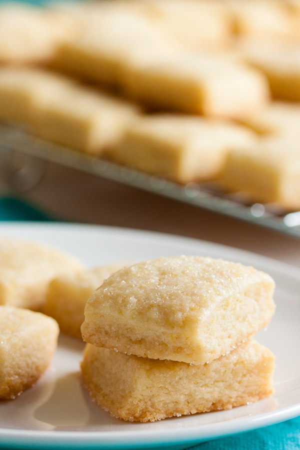This tiny lemon shortbread cookie is soft and tender and buttery. A lovely variation on traditional shortbread.