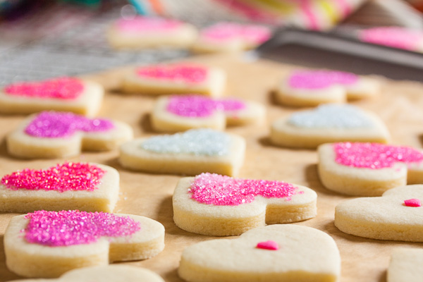 These tender, soft sugar cookies are one of my new favourites. They have a hint of lemon flavour and can be simply decorated with sanding sugars.