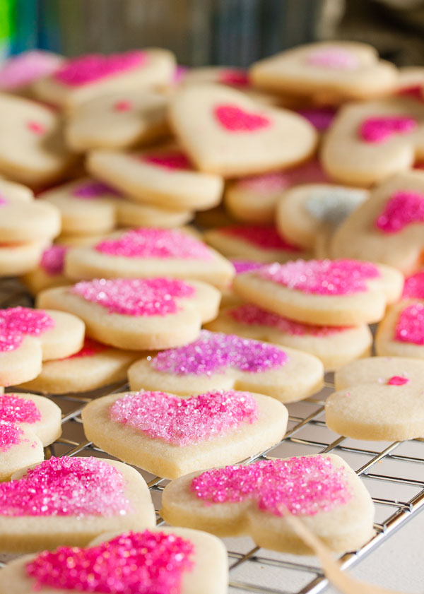 These tender, soft sugar cookies are one of my new favourites. They have a hint of lemon flavour and can be simply decorated with sanding sugars.