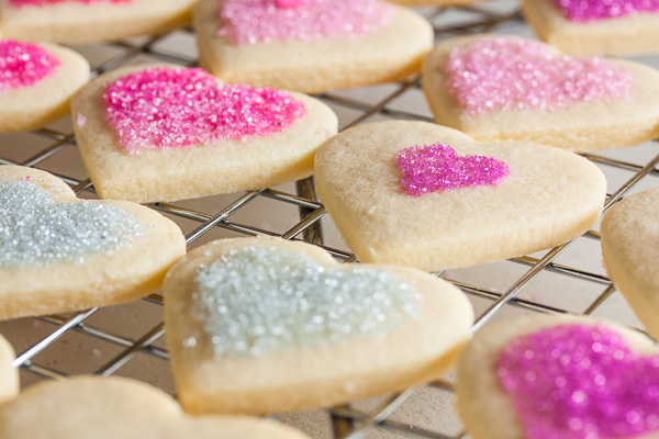 These tender, soft sugar cookies are one of my new favourites. They have a hint of lemon flavour and can be simply decorated with sanding sugars.
