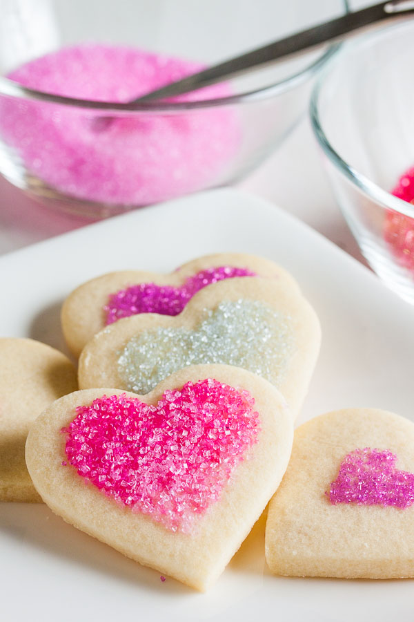 These tender, soft sugar cookies are one of my new favourites. They have a hint of lemon flavour and can be simply decorated with sanding sugars.