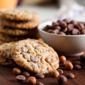 Milk Chocolate Caramel Cookies – chocolate chips, caramel chunks, and oatmeal combine to make a delicious, sweet, chewy cookie.