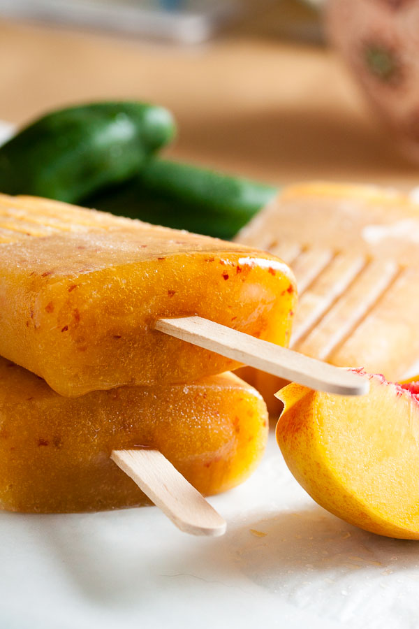 Peach Jalapeño Popsicles – a sweet treat with a bit of heat is a beautiful thing.
