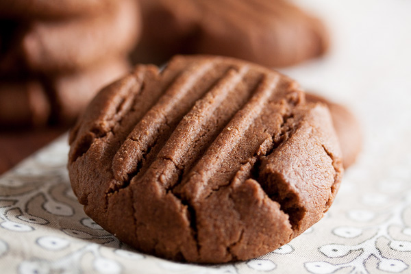 Soft and tender Chocolate Peanut Butter Cookies, made with melted chocolate right in the dough.