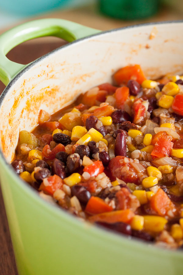 This vibrantly coloured rainbow vegetarian chili is hearty and filling, with a nice bit of heat, and loaded with a wide variety of vegetables and beans.