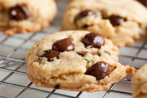 Made with browned butter, Kentucky bourbon, and fresh tarragon, these soft and gooey Bourbon Chocolate Chip Cookies have a great, rich flavour.