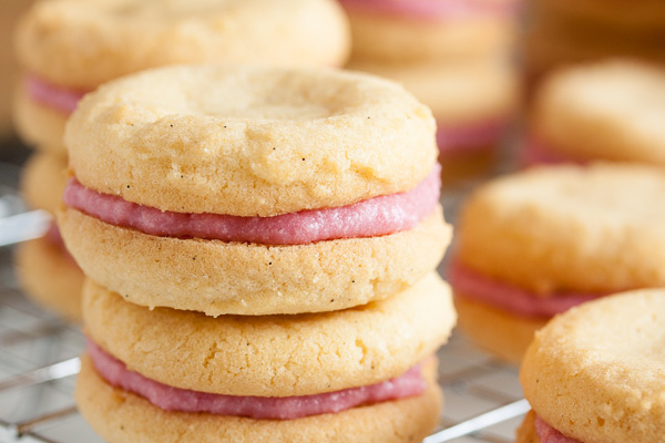 These Raspberry Cream Sandwich Cookies combine a delicate vanilla cookie with a sweet cream filling made with real raspberries.
