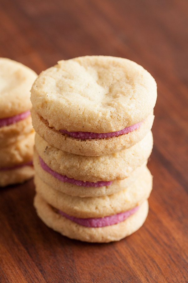 These Raspberry Cream Sandwich Cookies combine a delicate vanilla cookie with a sweet cream filling made with real raspberries.