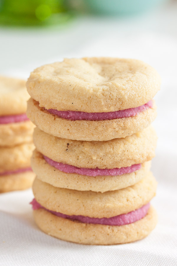 These Raspberry Cream Sandwich Cookies combine a delicate vanilla cookie with a sweet cream filling made with real raspberries.