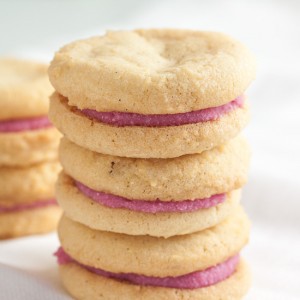 These Raspberry Cream Sandwich Cookies combine a delicate vanilla cookie with a sweet cream filling made with real raspberries.