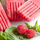 Raspberry Basil Popsicles. All the lovely tart, sweet flavour of raspberries, cut slightly by spicy, earthy basil.