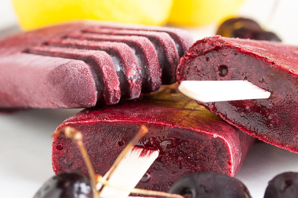 Enjoy the bounty of summer with these delicious cherry popsicles. Sweet and juicy and full of flavour.