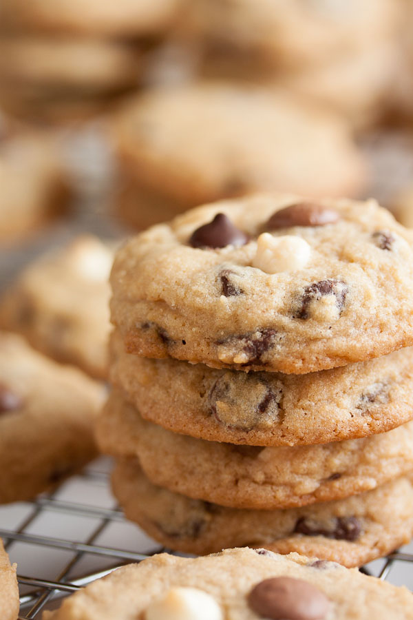 Soft and chewy Triple Chocolate Chip Cookies, taking it to the next level with tons of semisweet, milk, and white chocolate chips.