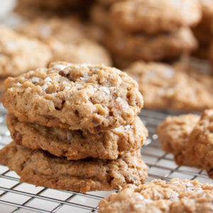 Oatmeal Salted Caramel Cookies – a perfectly chewy cookie, studded with crunchy pecans, lots of sweet caramel bits, and topped with a generous sprinkling of flaked sea salt.