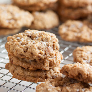 Oatmeal Salted Caramel Cookies – a perfectly chewy cookie, studded with crunchy pecans, lots of sweet caramel bits, and topped with a generous sprinkling of flaked sea salt.