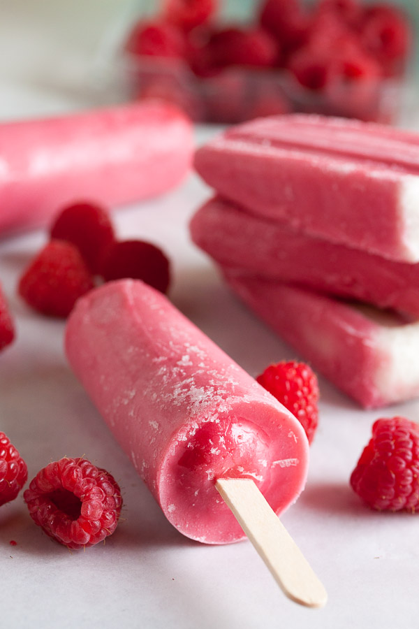 Raspberry Sherbet Popsicles, made with lots of plump juicy raspberries, fresh from the farmer's market. A great way to prolong the fresh flavours of summer!