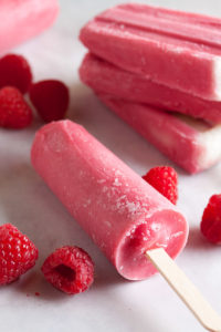 Raspberry Sherbet Popsicles, made with lots of plump juicy raspberries, fresh from the farmer's market. A great way to prolong the fresh flavours of summer!