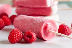 Raspberry Sherbet Popsicles, made with lots of plump juicy raspberries, fresh from the farmer's market. A great way to prolong the fresh flavours of summer!