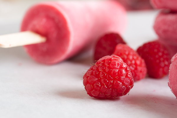 Raspberry Sherbet Popsicles, made with lots of plump juicy raspberries, fresh from the farmer's market. A great way to prolong the fresh flavours of summer!