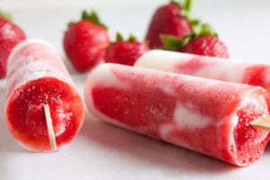 Strawberry-Swirl Vanilla Yogurt Popsicles – creamy vanilla yogurt and swirls of fresh strawberry purée, with all the bright fresh flavour you'd expect.