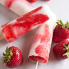 Strawberry-Swirl Vanilla Yogurt Popsicles – creamy vanilla yogurt and swirls of fresh strawberry purée, with all the bright fresh flavour you'd expect.