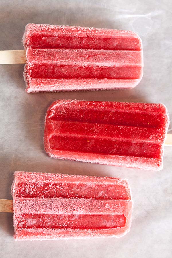 If you like strawberry rhubarb pie, you'll love these strawberry rhubarb popsicles. Sweet juicy strawberries plus sour rhubarb for a perfect summer treat!