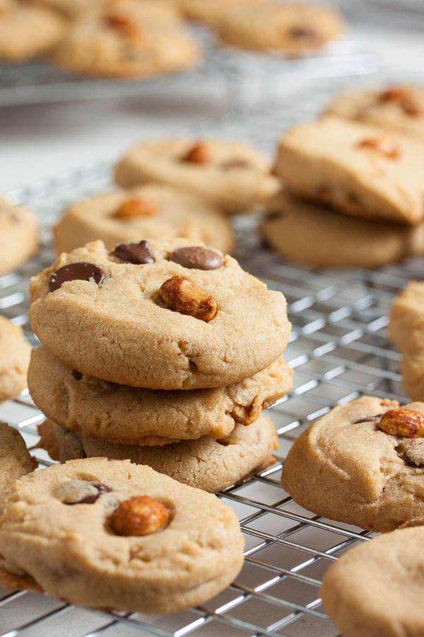 Peanut butter, peanut butter chips, AND honey roasted peanuts are the basis for these amazing Triple Peanut and Chocolate Chip Cookies!