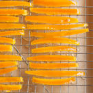Candied orange peel is deceptively simple to make and loaded with flavour! It can be eaten as-is (delicious!) or used in other recipes.