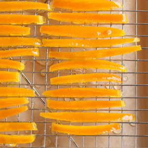 Candied orange peel is deceptively simple to make and loaded with flavour! It can be eaten as-is (delicious!) or used in other recipes.