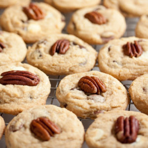 Triple Chocolate Pecan Cookies – soft and chewy, loaded with milk, white, and dark chocolate chips, and topped by a crunchy toasted pecan.