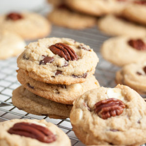 Triple Chocolate Pecan Cookies – soft and chewy, loaded with milk, white, and dark chocolate chips, and topped by a crunchy toasted pecan.