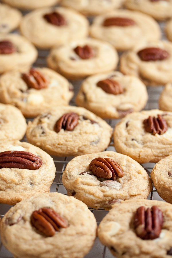 Triple Chocolate Pecan Cookies – soft and chewy, loaded with milk, white, and dark chocolate chips, and topped by a crunchy toasted pecan.