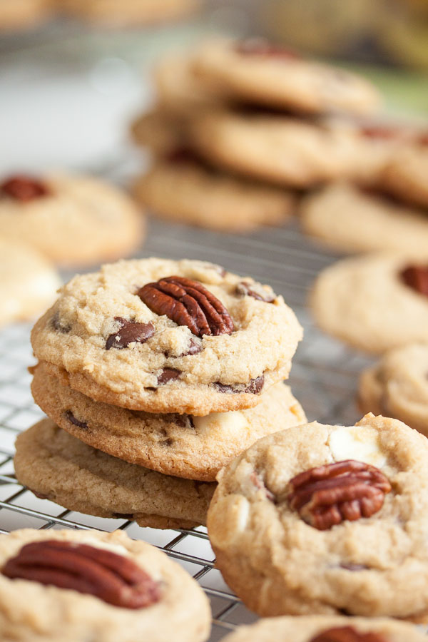Triple Chocolate Pecan Cookies – soft and chewy, loaded with milk, white, and dark chocolate chips, and topped by a crunchy toasted pecan.