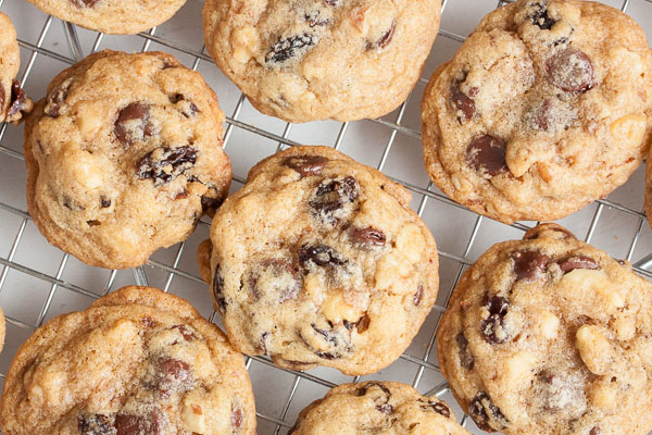 These Chunky Bar Cookies will remind you of the candy bar of the same name – loaded with lots of chocolate, raisins, and crunchy toasted nuts!